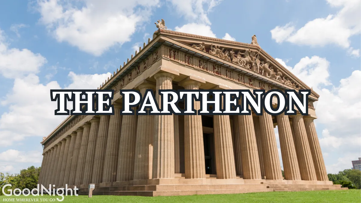 A striking view of Nashville’s full-scale Parthenon replica in Centennial Park, showcasing its grand columns, ornate roof sculptures, and the open, inviting park setting on a clear day.